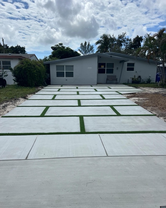 Clean concrete slab driveway installation in South Florida
