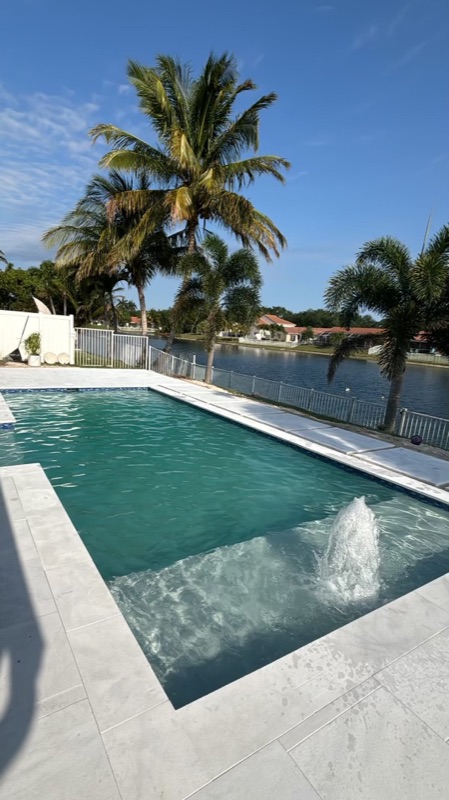 Custom pergola installation in a South Florida backyard