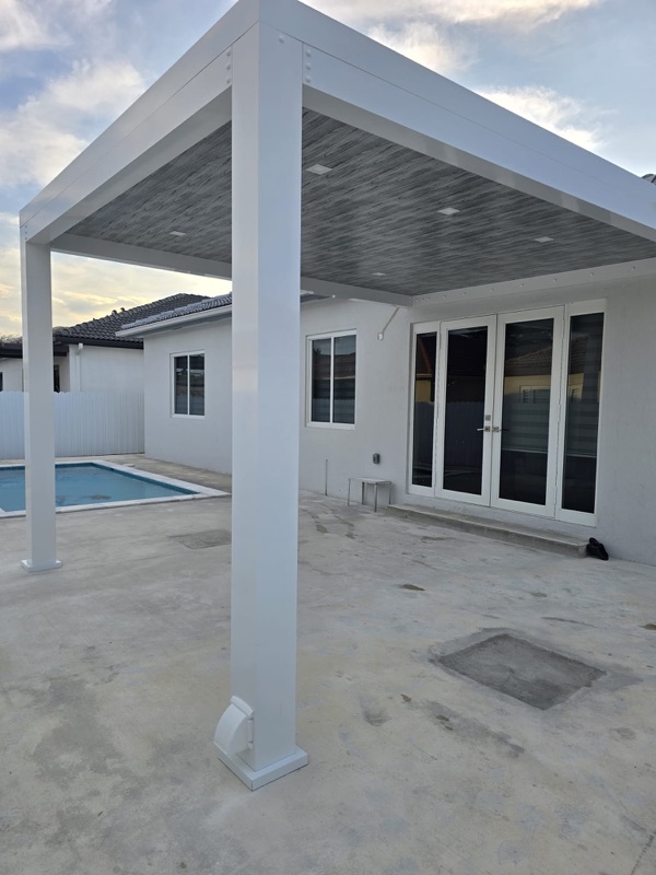 Modern aluminum pergola over a concrete patio