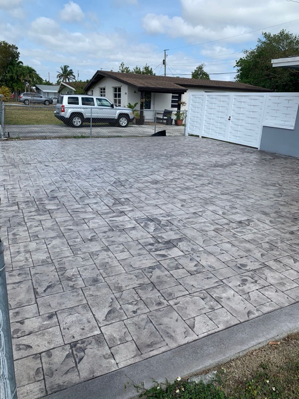 Stamped concrete walkway with brick pattern in Hialeah FL