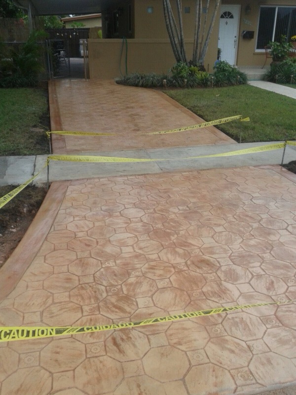 Stamped concrete pool deck installation in Doral FL