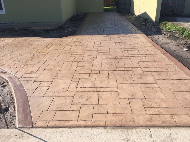 Custom stamped concrete patio with slate pattern in Hollywood FL